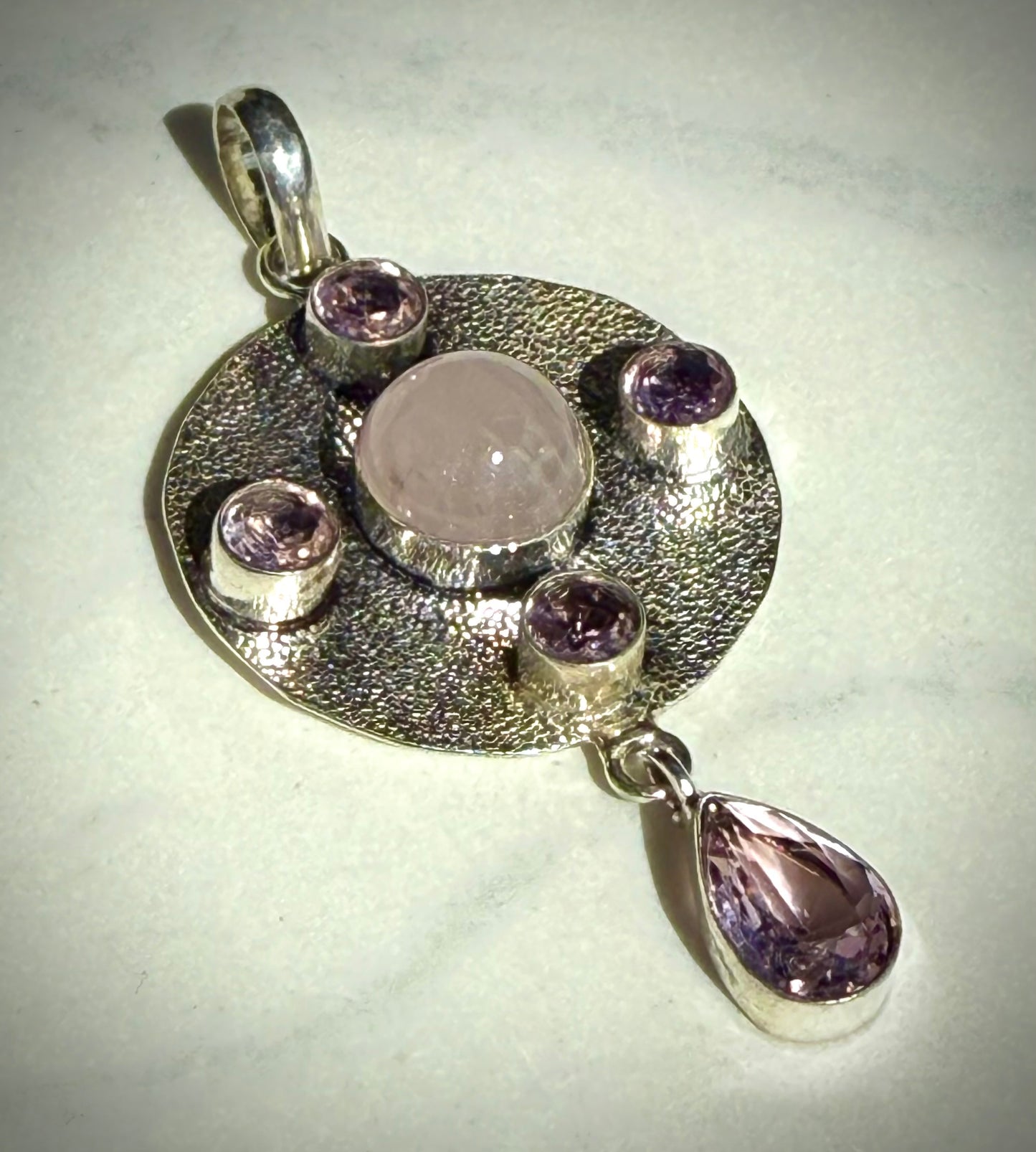 Eye Catching Rose Quartz and Pink Topaz Droplet Pendant Pendant in Silver